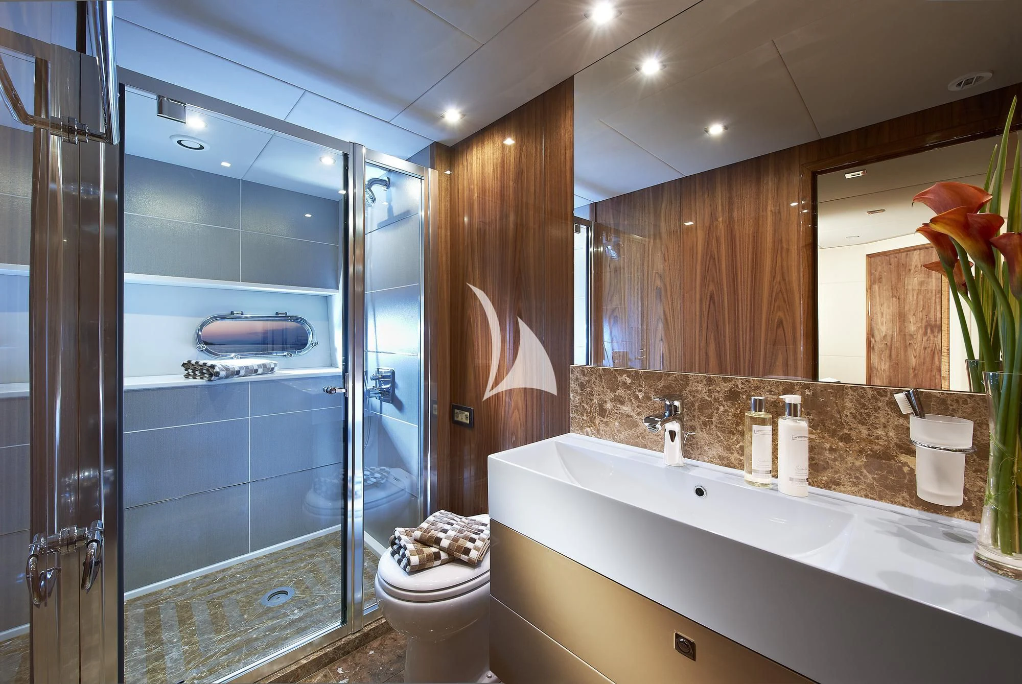 a bathroom with a glass shower aboard HIGH ENERGY Yacht for Sale
