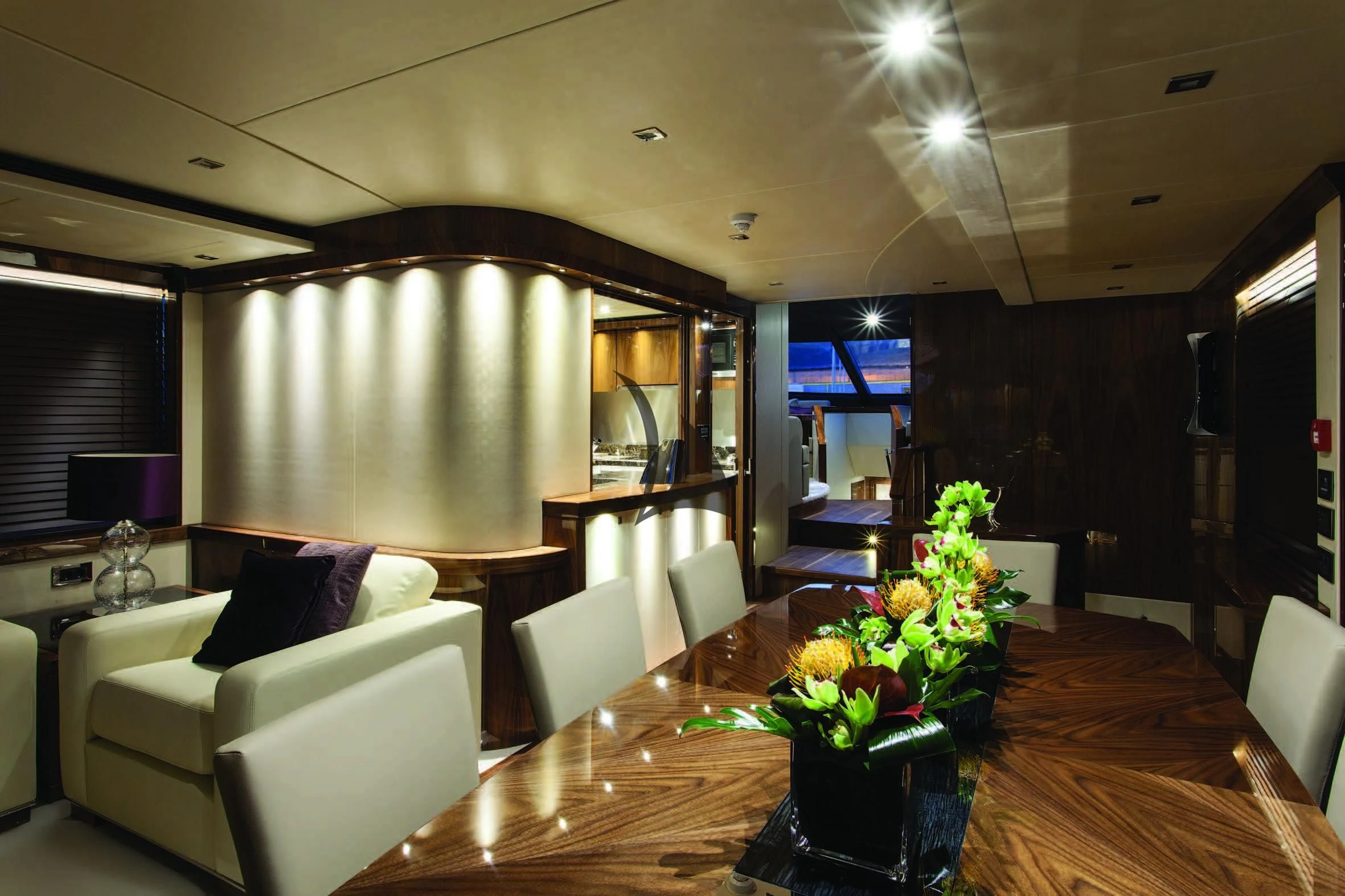 a large room with a table and chairs aboard HIGH ENERGY Yacht for Sale