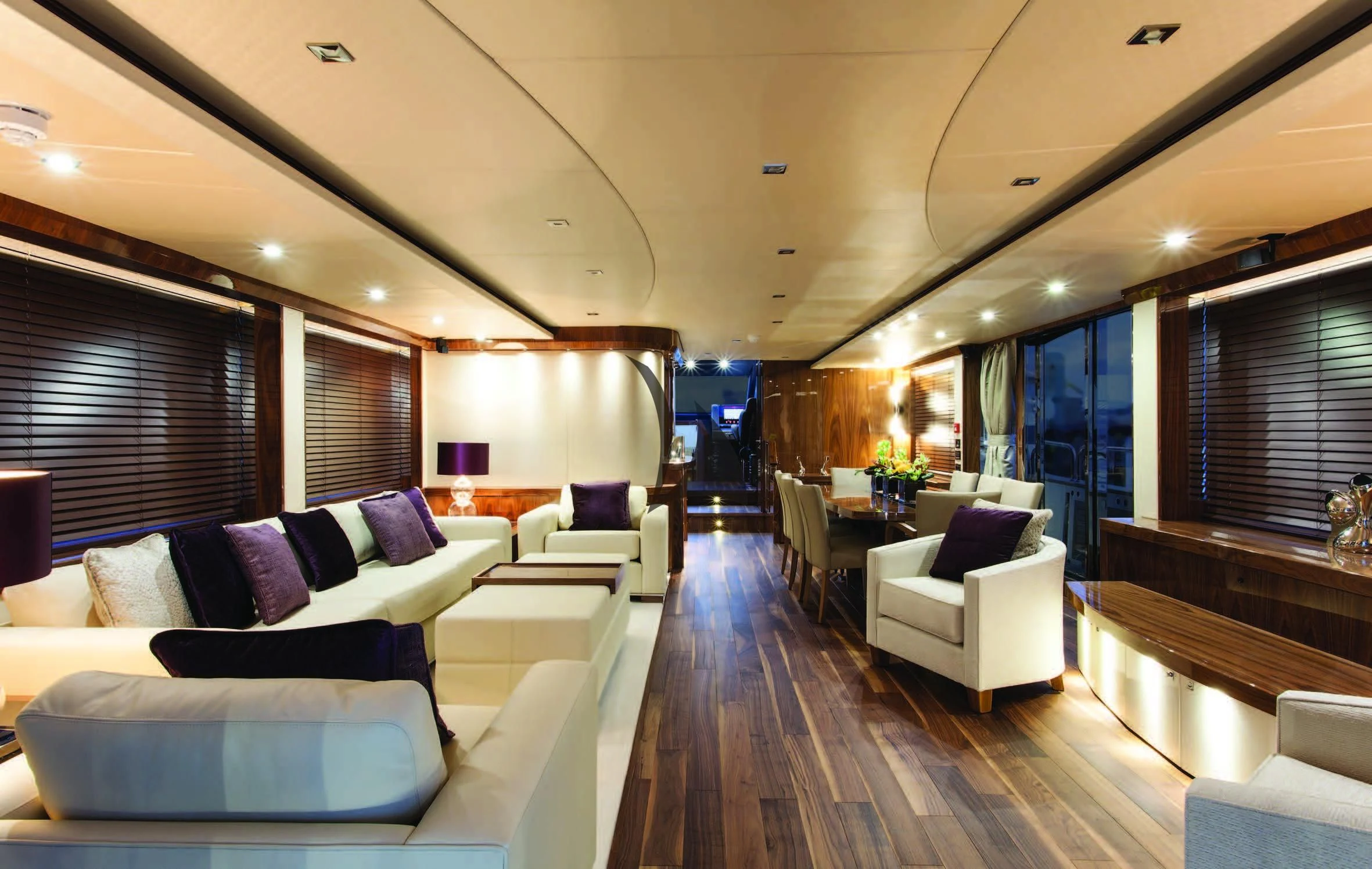 a living room with a wood floor aboard HIGH ENERGY Yacht for Sale