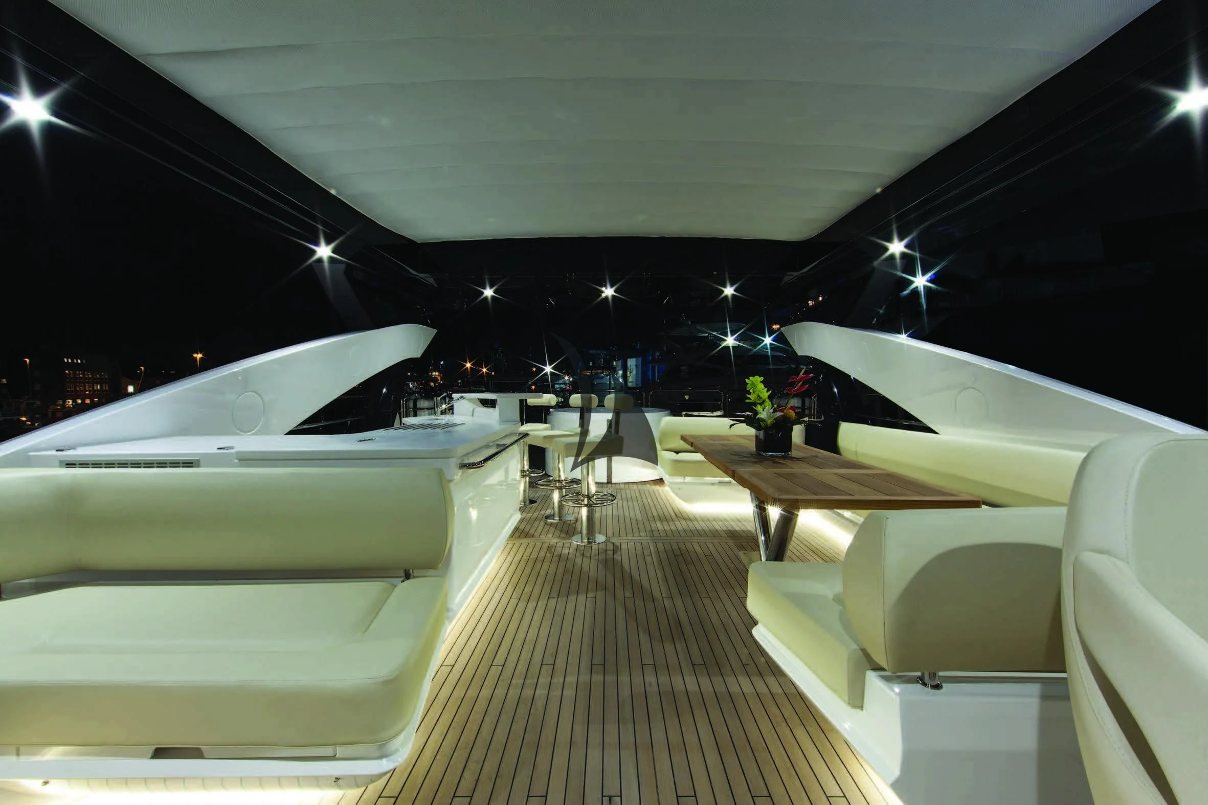 a room with white chairs and tables aboard HIGH ENERGY Yacht for Sale