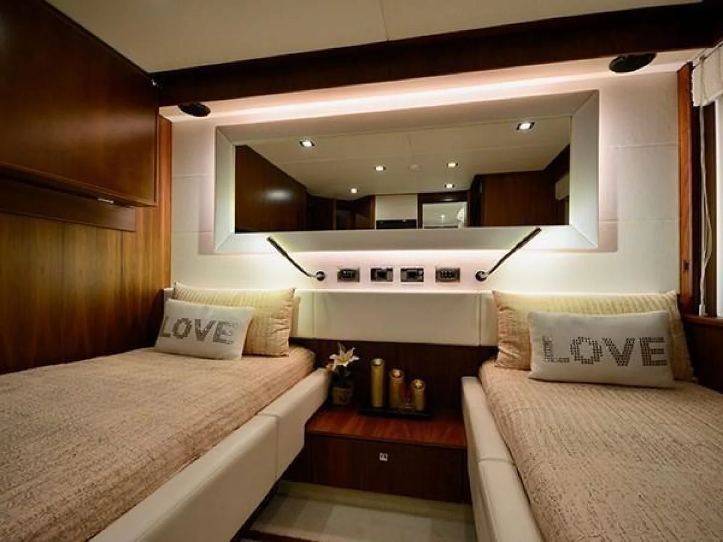 a room with two beds aboard EXIMIUS Yacht for Sale