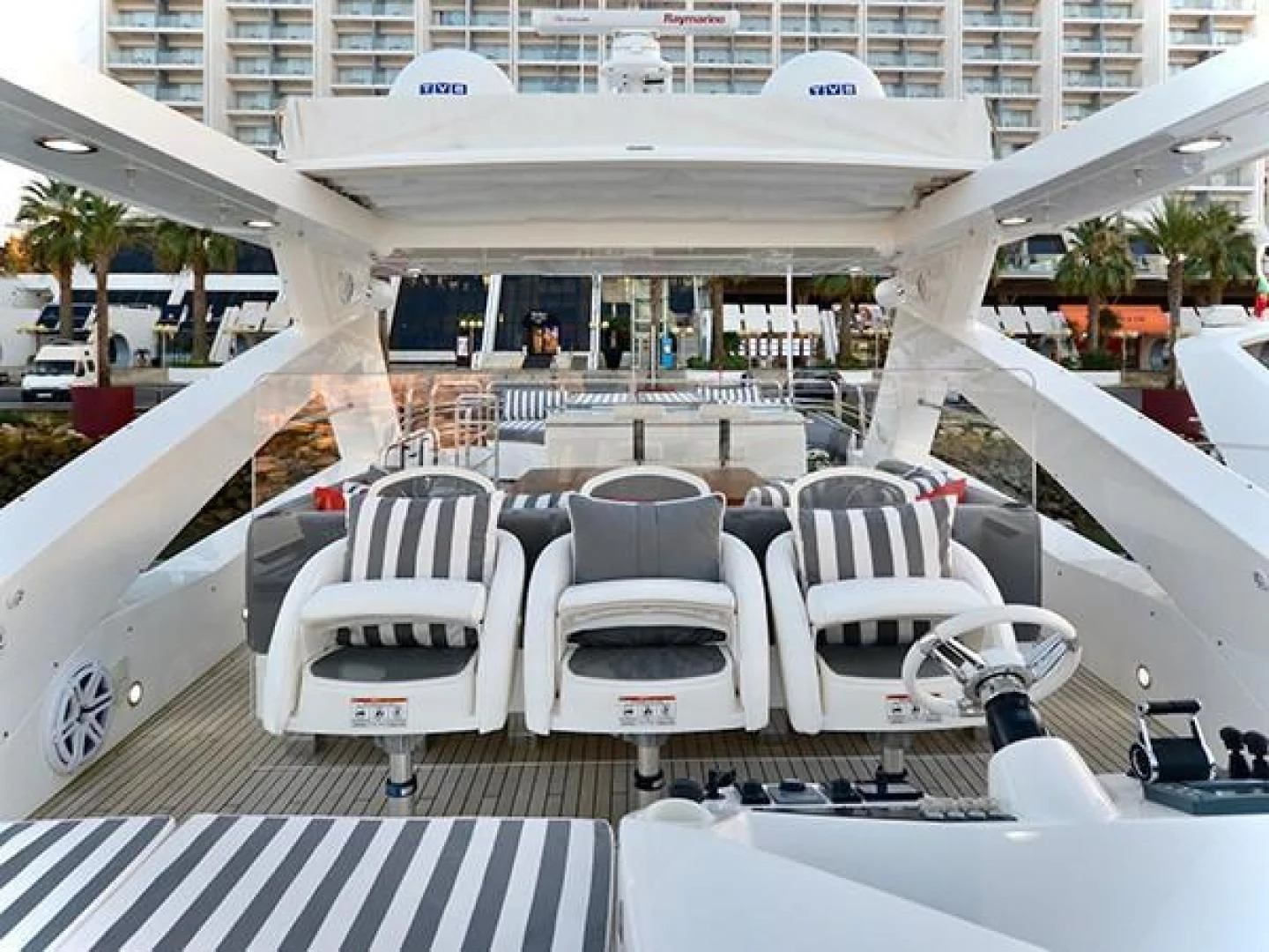 a group of chairs on a deck aboard EXIMIUS Yacht for Sale