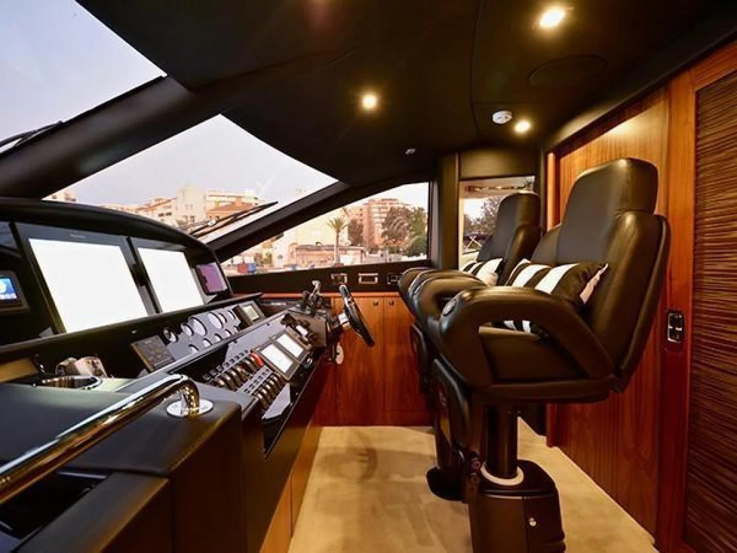a car with a musical instrument aboard EXIMIUS Yacht for Sale