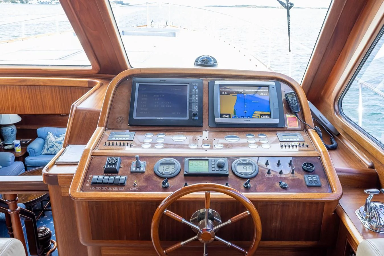 a wooden radio with a steering wheel aboard 85 CLASSIC Yacht for Sale
