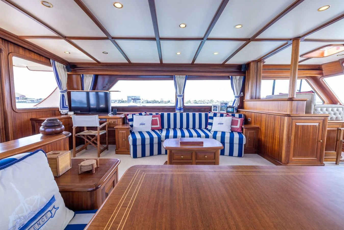 a room with a bed and a table aboard 85 CLASSIC Yacht for Sale