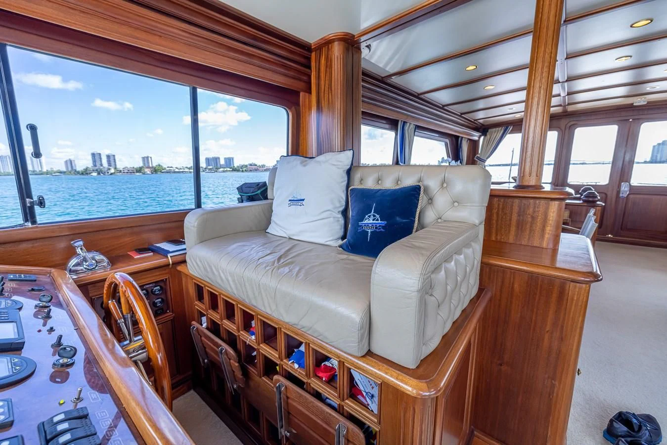 a living room with a large window aboard 85 CLASSIC Yacht for Sale