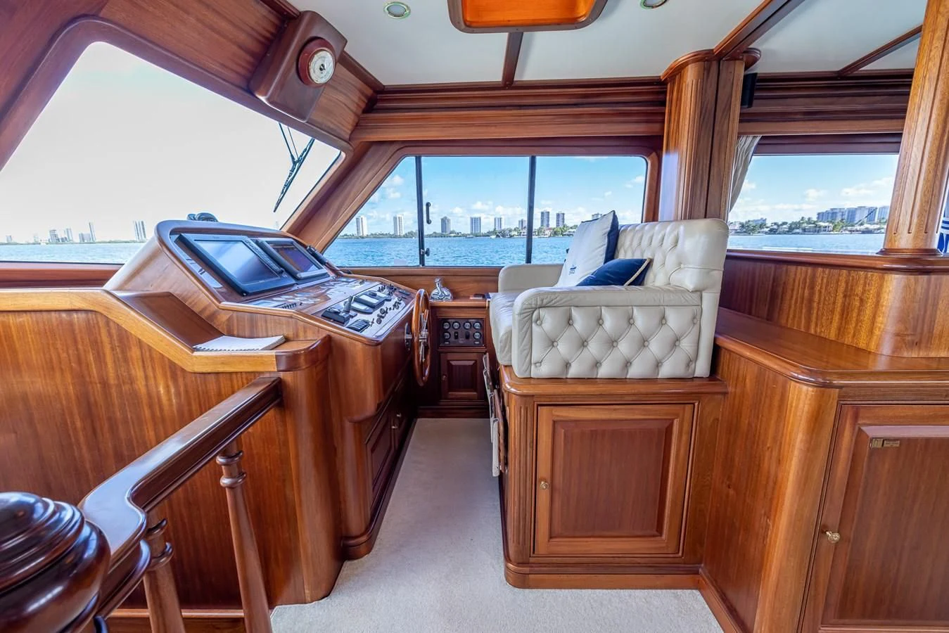 a room with a piano and a piano aboard 85 CLASSIC Yacht for Sale