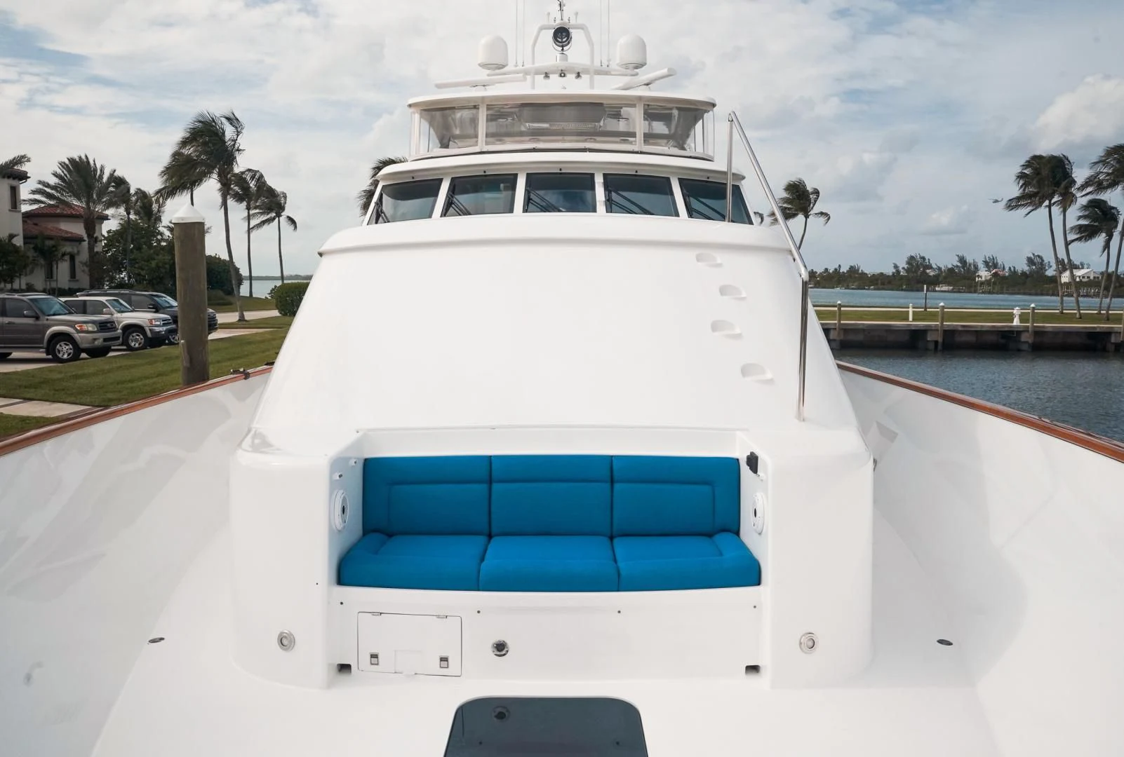 a white boat on a dock aboard HAU TREE Yacht for Sale