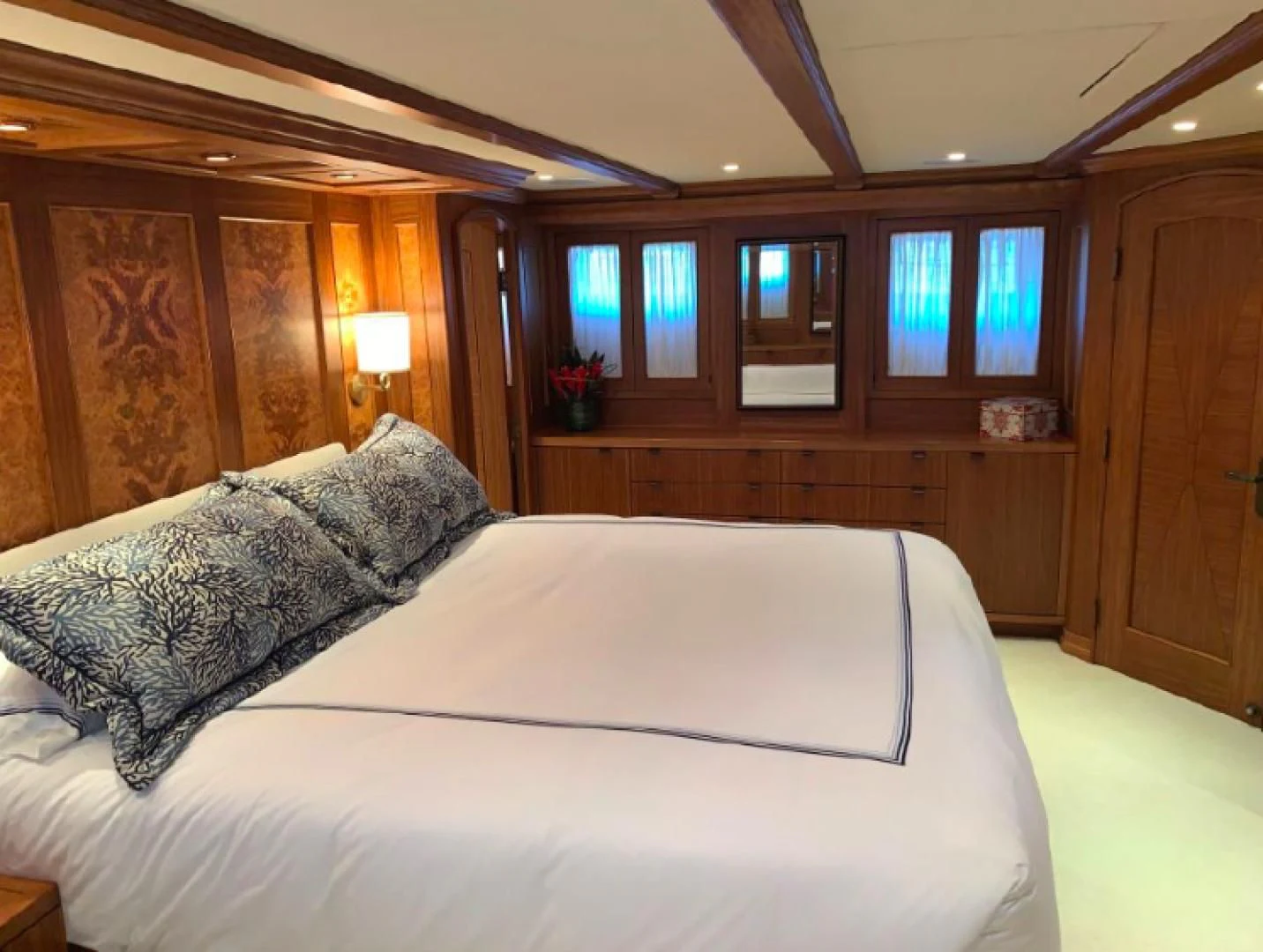 a bed in a room aboard HAU TREE Yacht for Sale