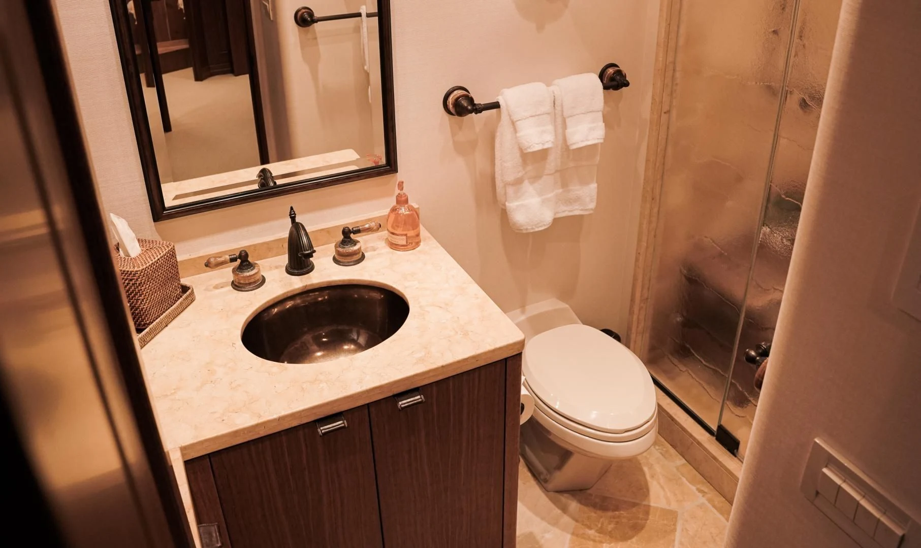 a bathroom with a sink toilet and a shower aboard HAU TREE Yacht for Sale