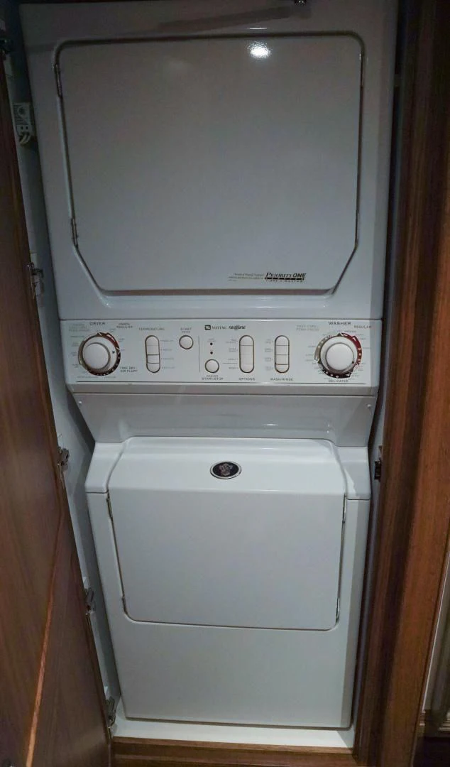 a white machine with a vent aboard HAU TREE Yacht for Sale