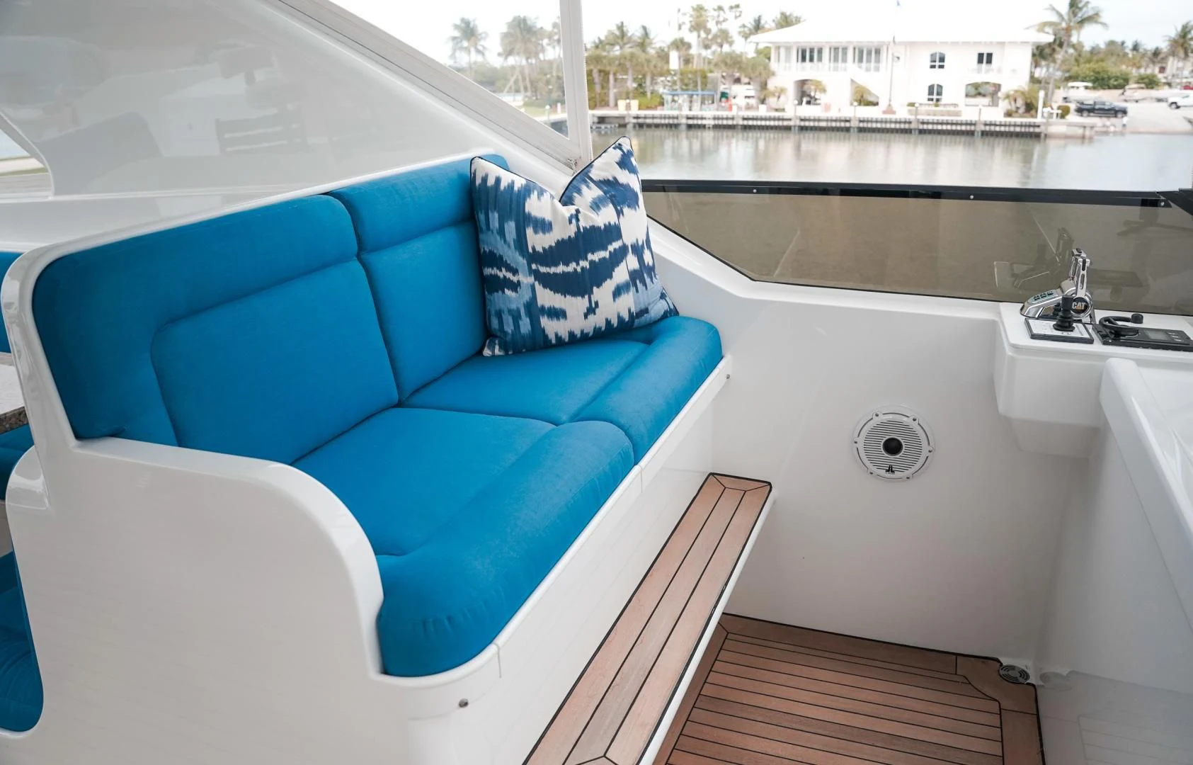 a bathtub and a couch in a room with a window aboard HAU TREE Yacht for Sale