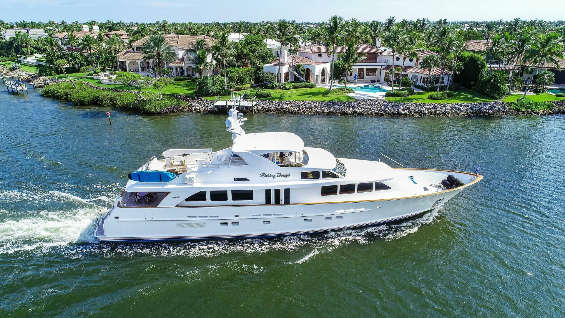 a white boat on water aboard HAU TREE Yacht for Sale