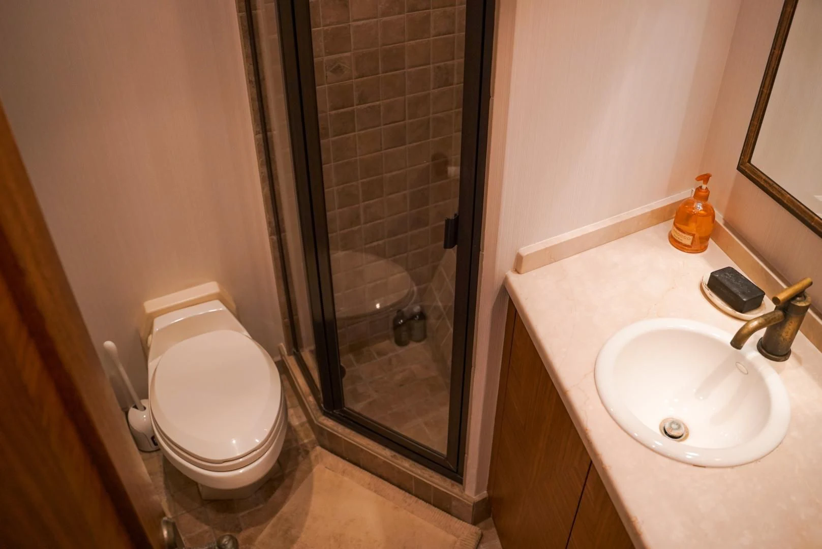 a bathroom with a sink and a toilet aboard HAU TREE Yacht for Sale