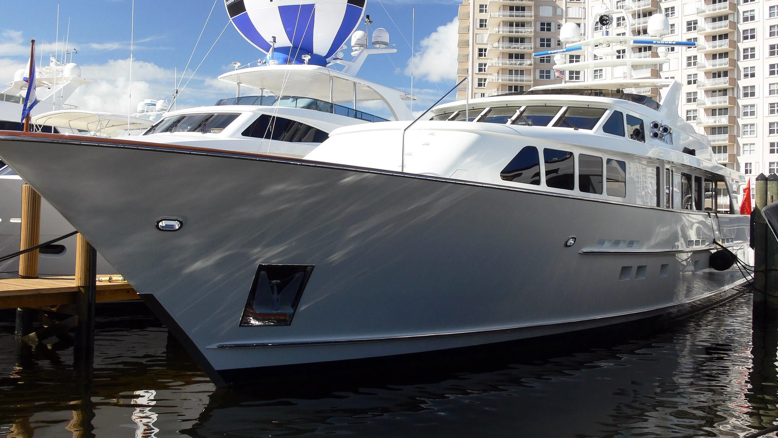a boat docked at a pier aboard HAU TREE Yacht for Sale
