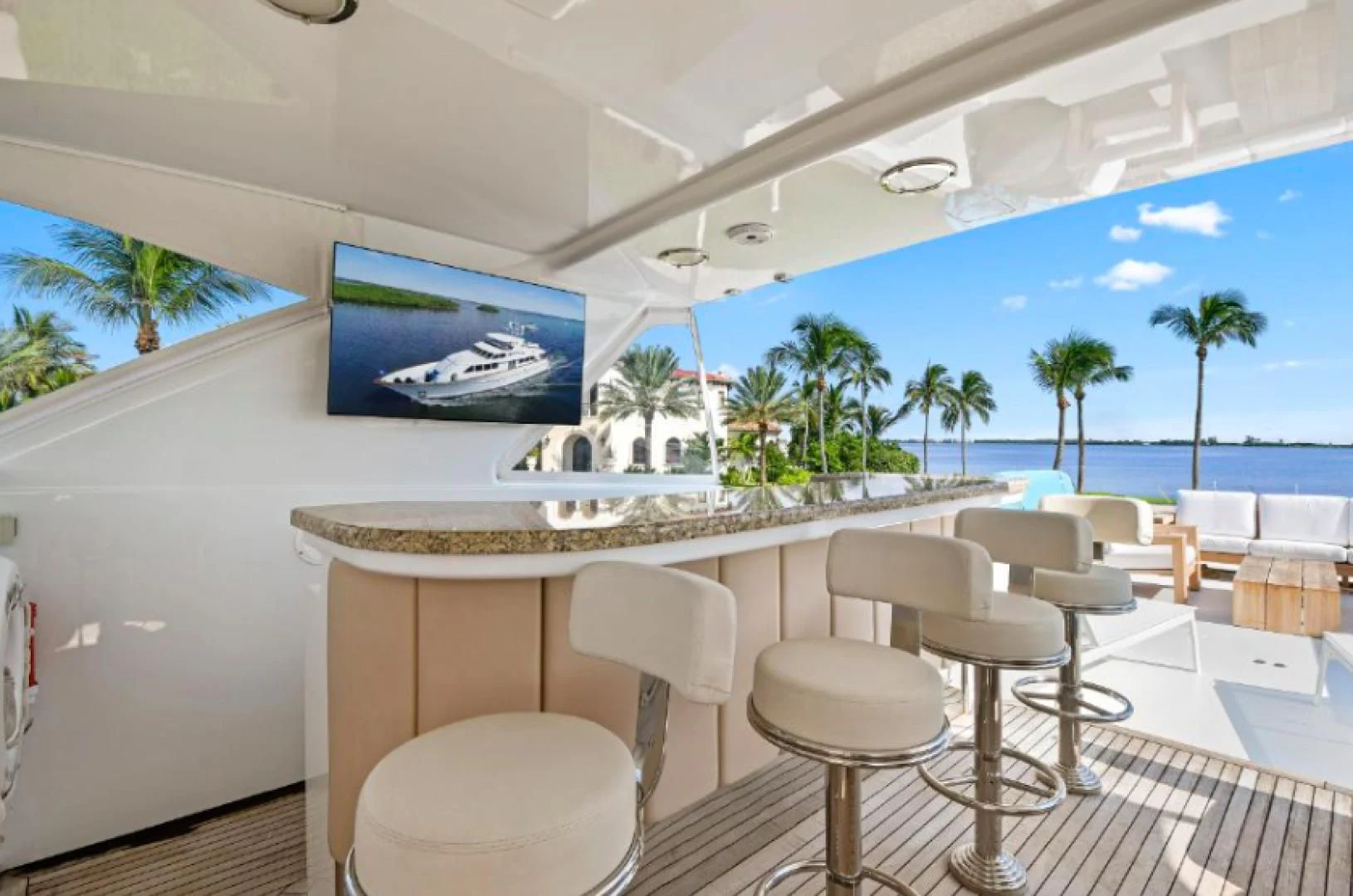 a room with tables and chairs aboard HAU TREE Yacht for Sale