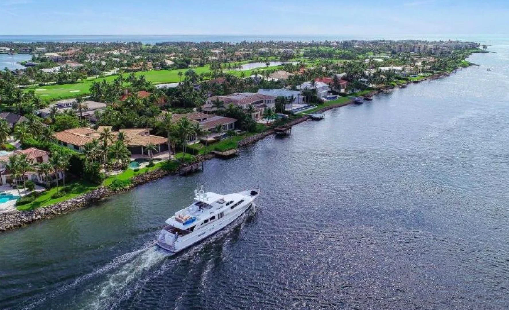 a boat sailing on the water aboard HAU TREE Yacht for Sale