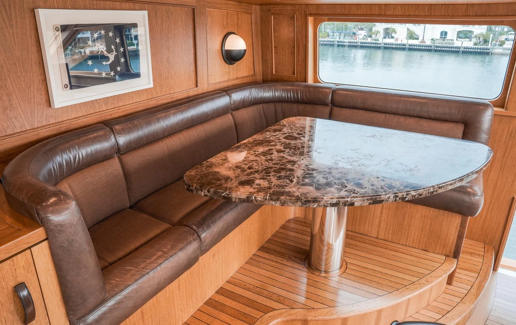 a leather couch in a room aboard HAU TREE Yacht for Sale