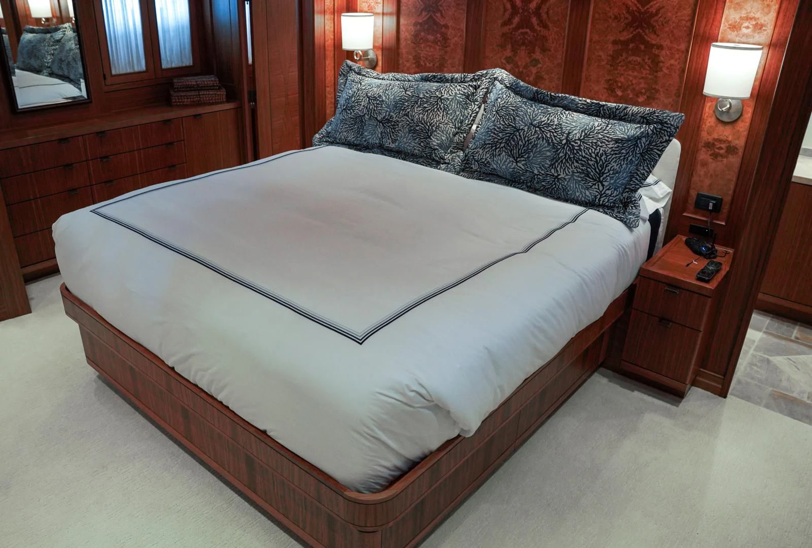 a bed with a white sheet aboard HAU TREE Yacht for Sale