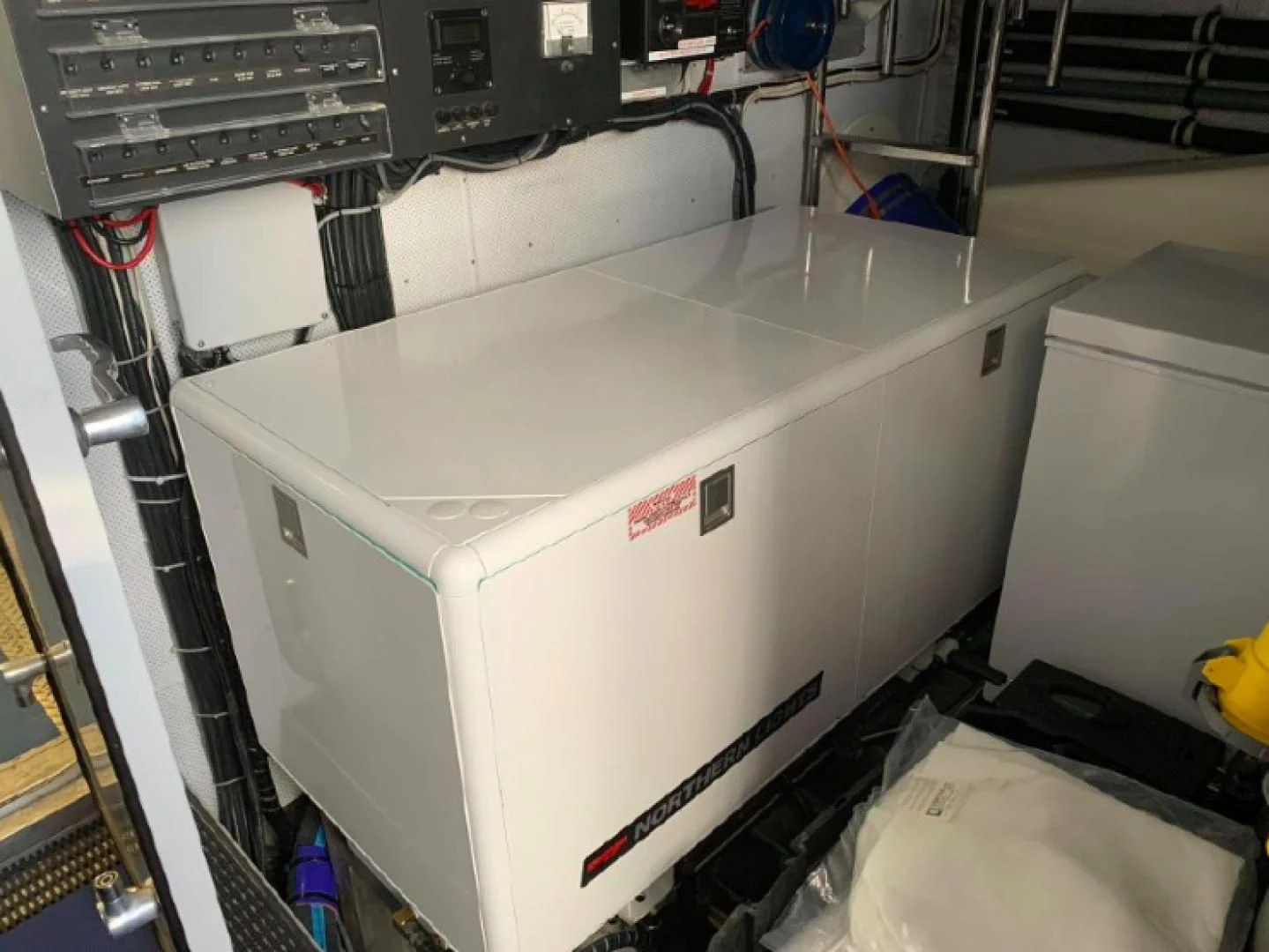 a machine with a red and white label aboard HAU TREE Yacht for Sale