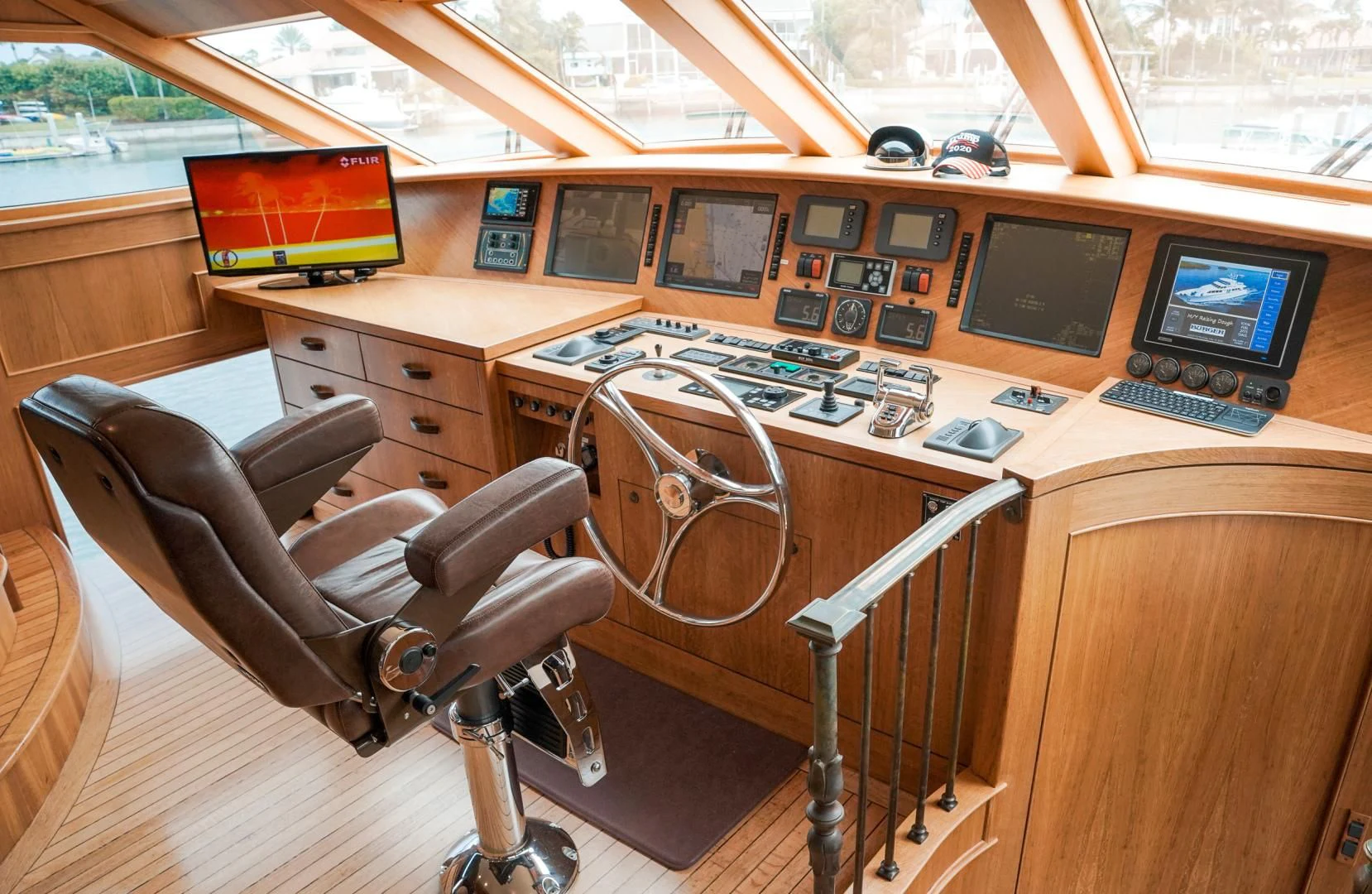 a room with a desk and computer aboard HAU TREE Yacht for Sale