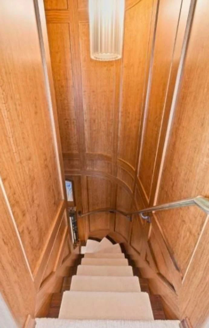 a staircase leading up to a building aboard HAU TREE Yacht for Sale