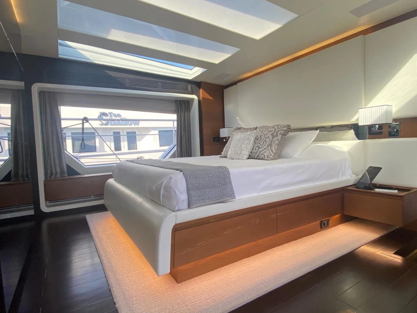 a bed in a room aboard LA TACHE Yacht for Sale
