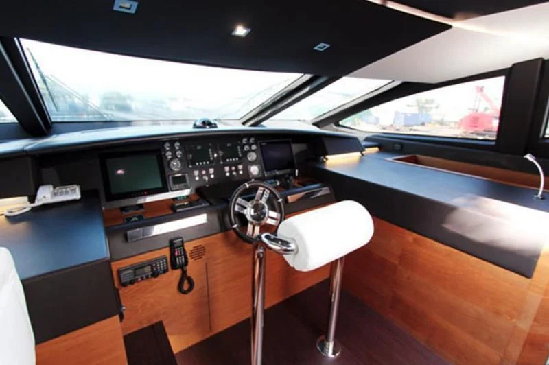 a black and white video game console aboard LA TACHE Yacht for Sale