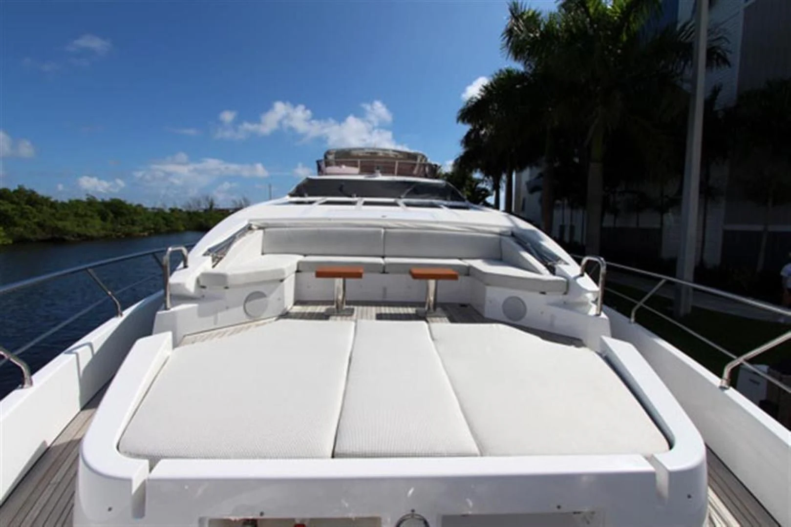 a white car on a boat aboard LA TACHE Yacht for Sale
