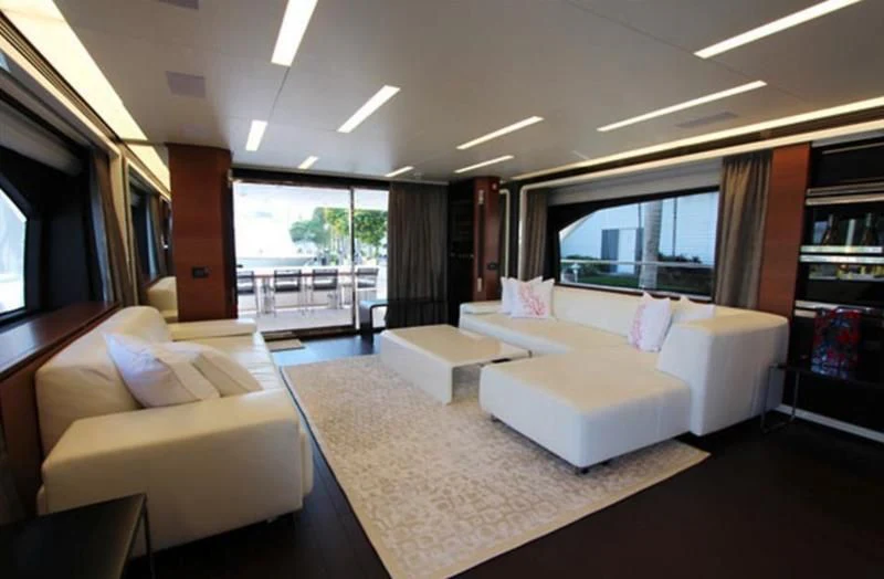 a living room with a large window aboard LA TACHE Yacht for Sale