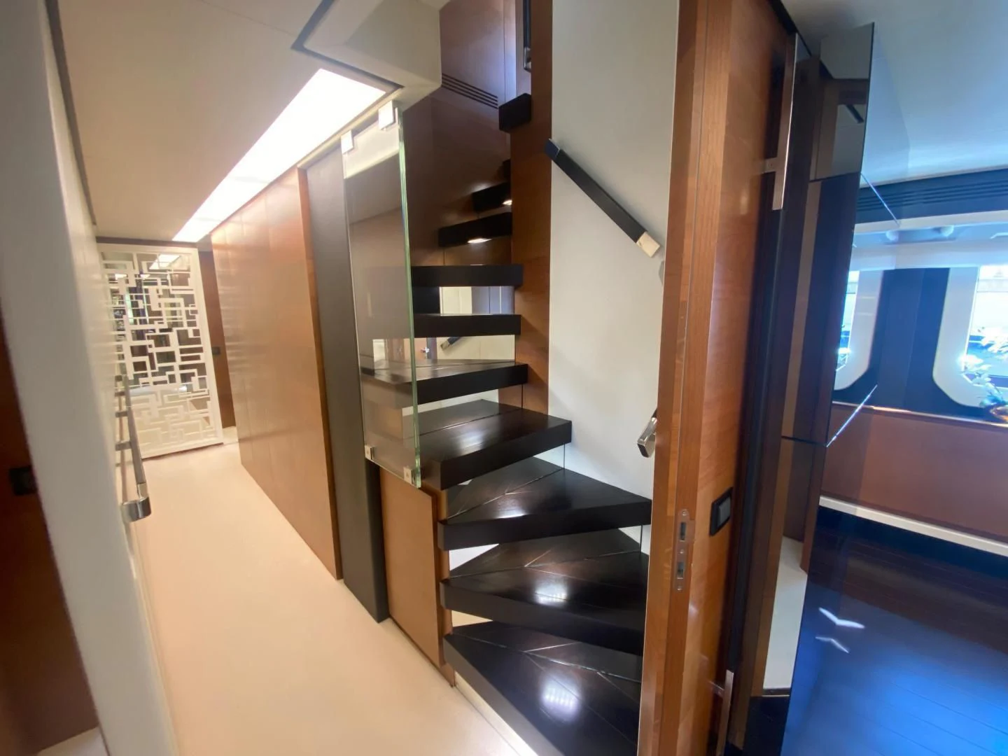 a room with a set of shelves aboard LA TACHE Yacht for Sale