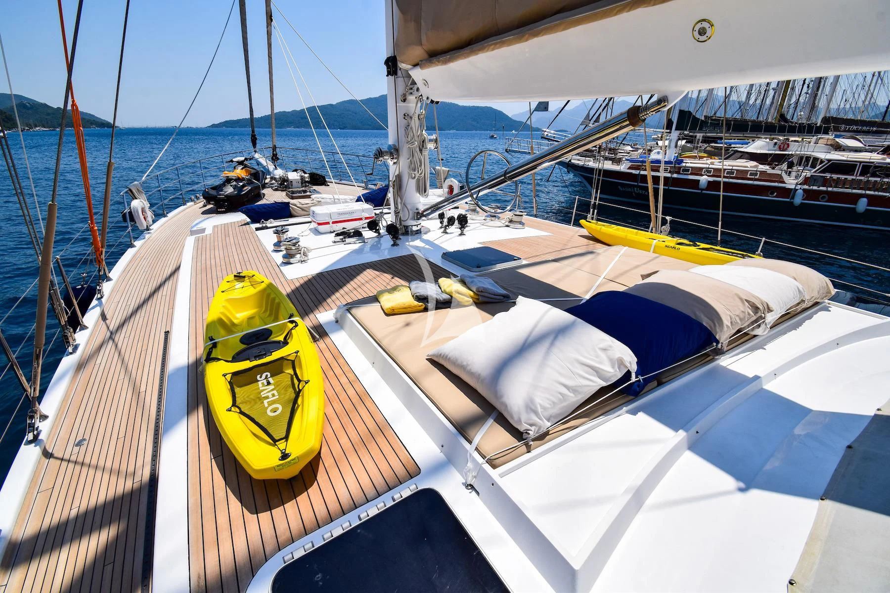 a boat with a yellow bucket on the front aboard UBI BENE Yacht for Charter