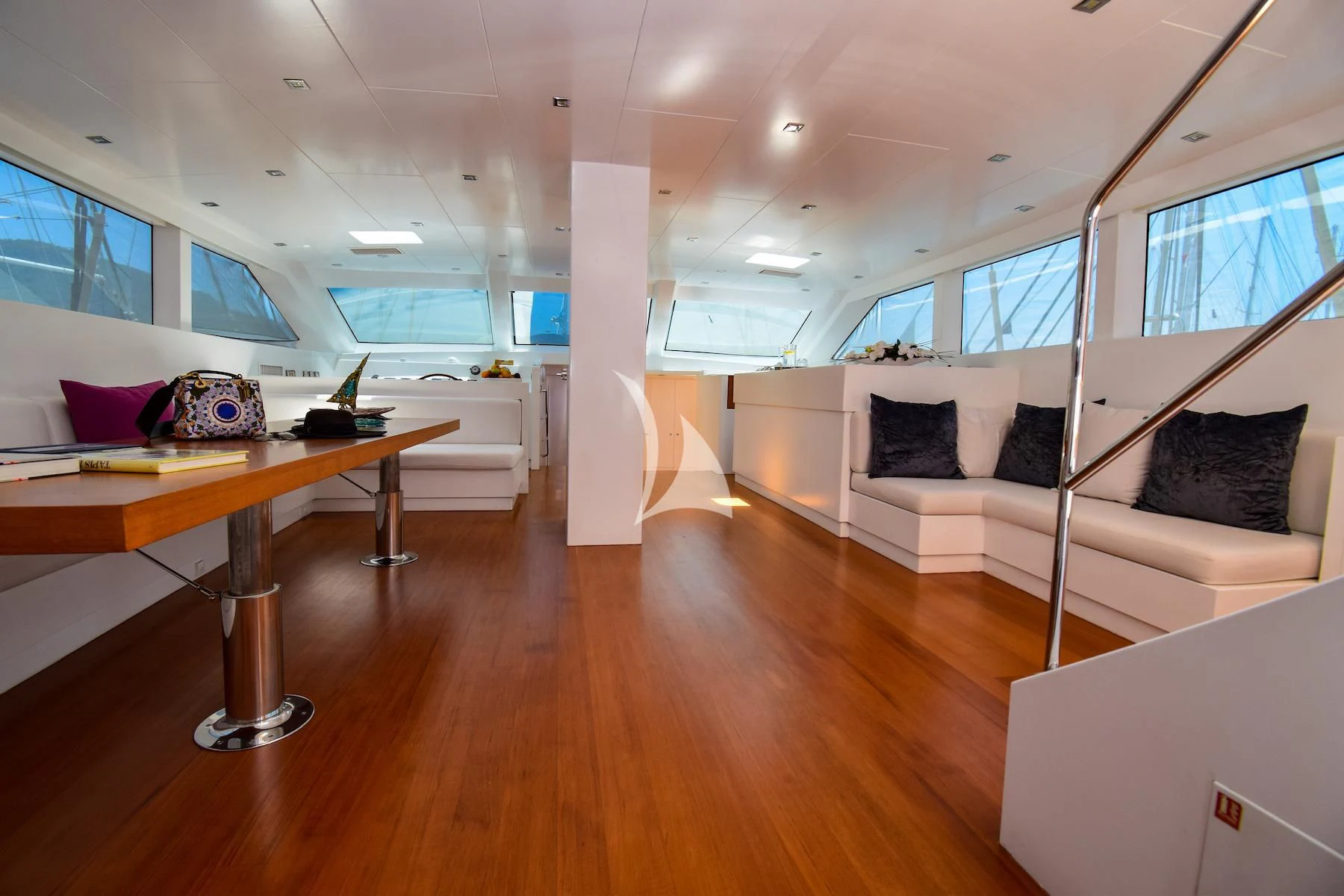 a room with a bed and desk aboard UBI BENE Yacht for Charter