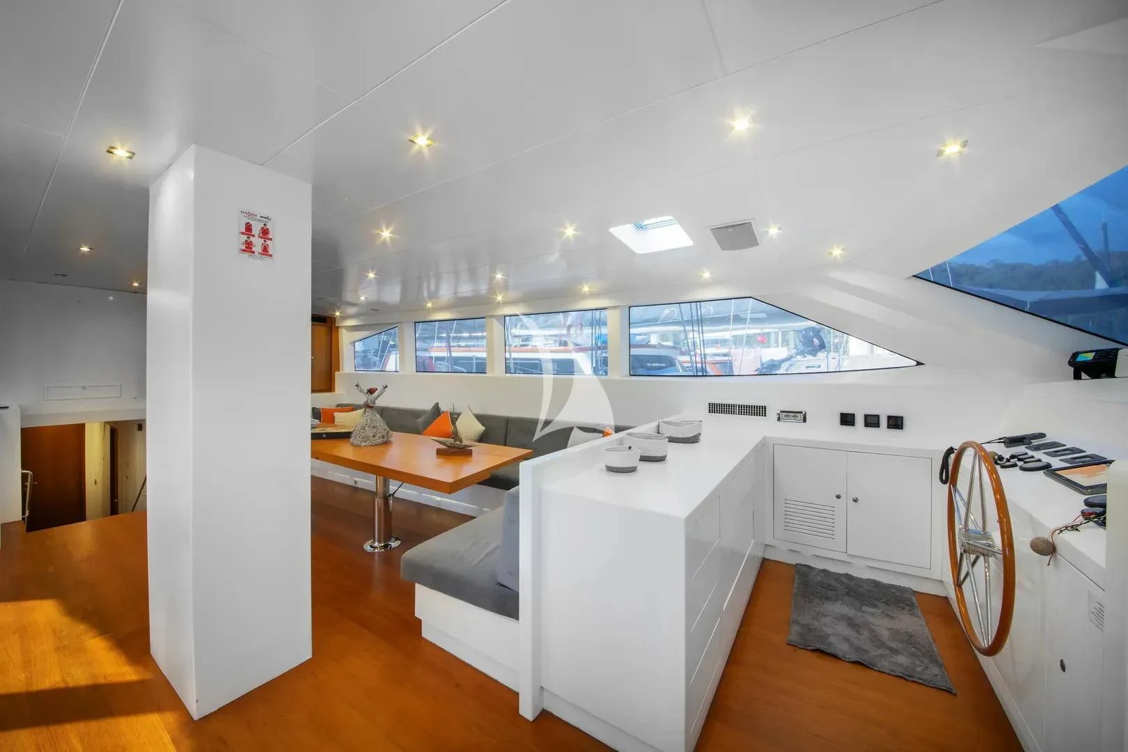 a room with a desk and a computer aboard UBI BENE Yacht for Charter