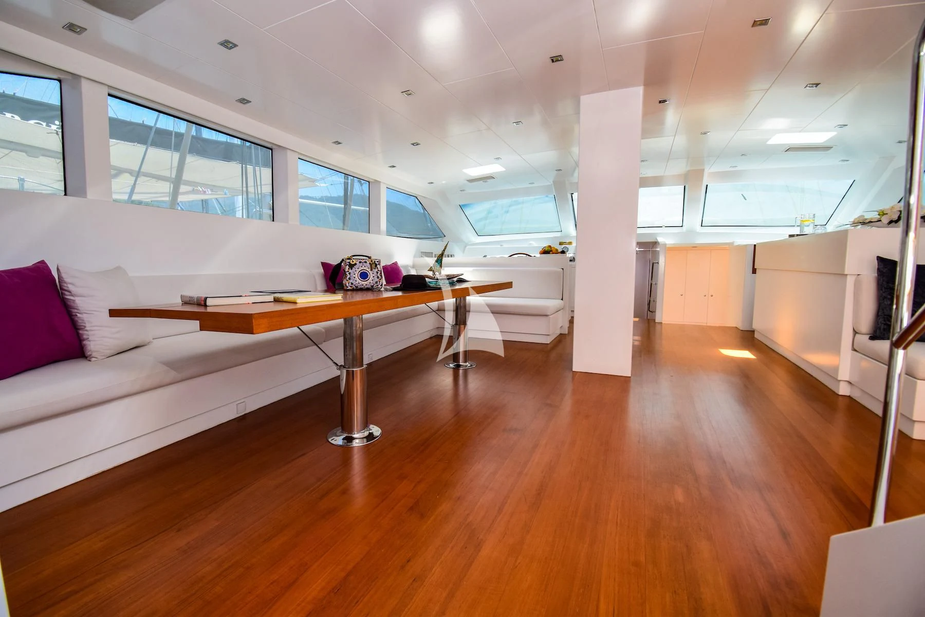 a room with a couch and a table aboard UBI BENE Yacht for Charter