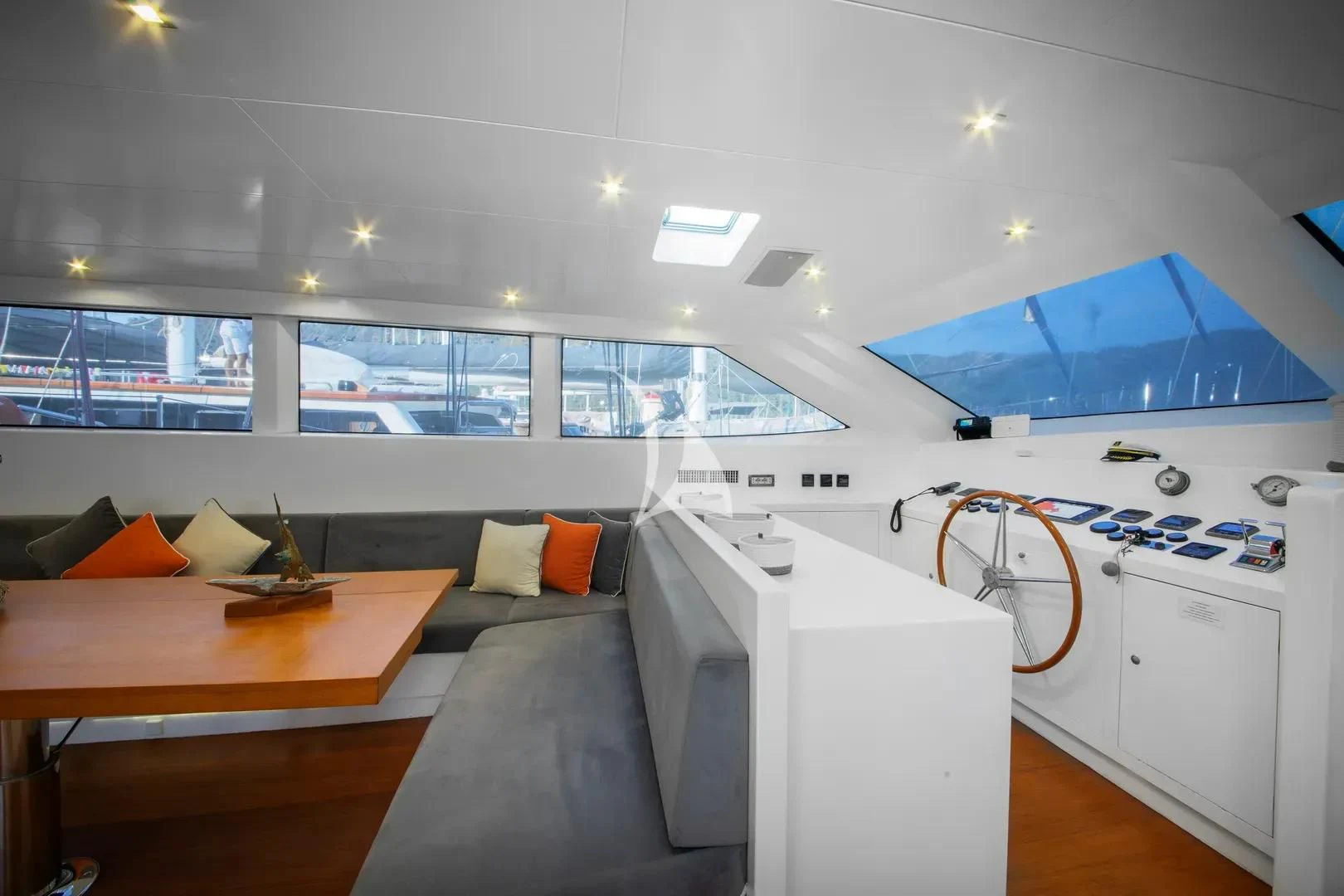 a room with a couch and a table aboard UBI BENE Yacht for Charter