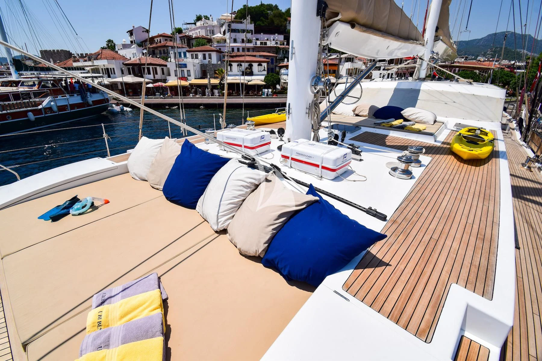 a boat docked at a pier aboard UBI BENE Yacht for Charter