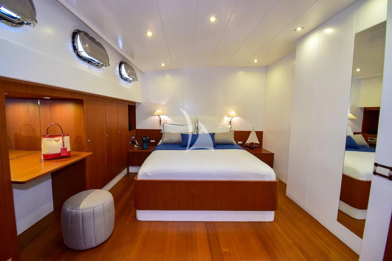 a bed in a room aboard UBI BENE Yacht for Charter