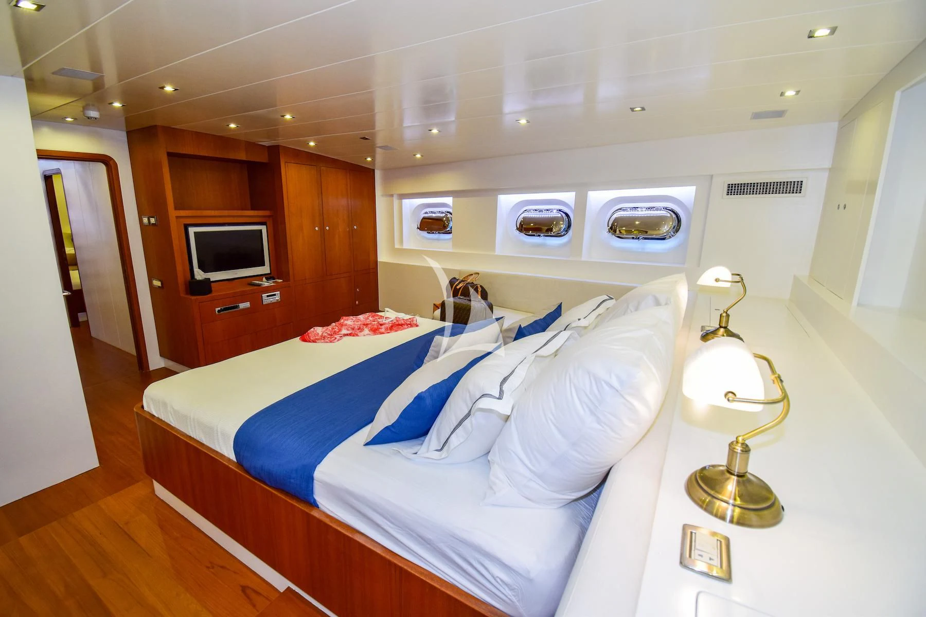 a room with two beds aboard UBI BENE Yacht for Charter