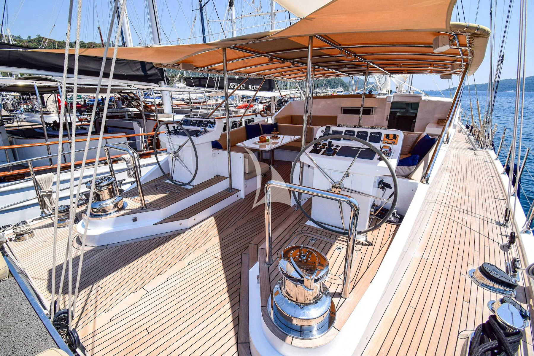 a boat is parked in the water aboard UBI BENE Yacht for Charter