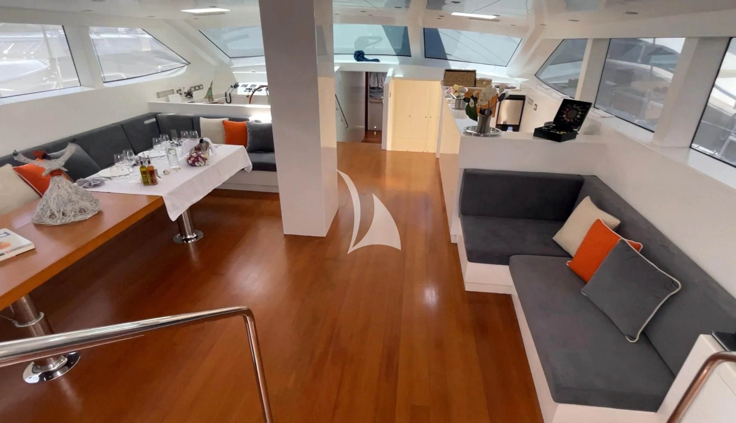 a room with a wood floor and a wood floor aboard UBI BENE Yacht for Charter