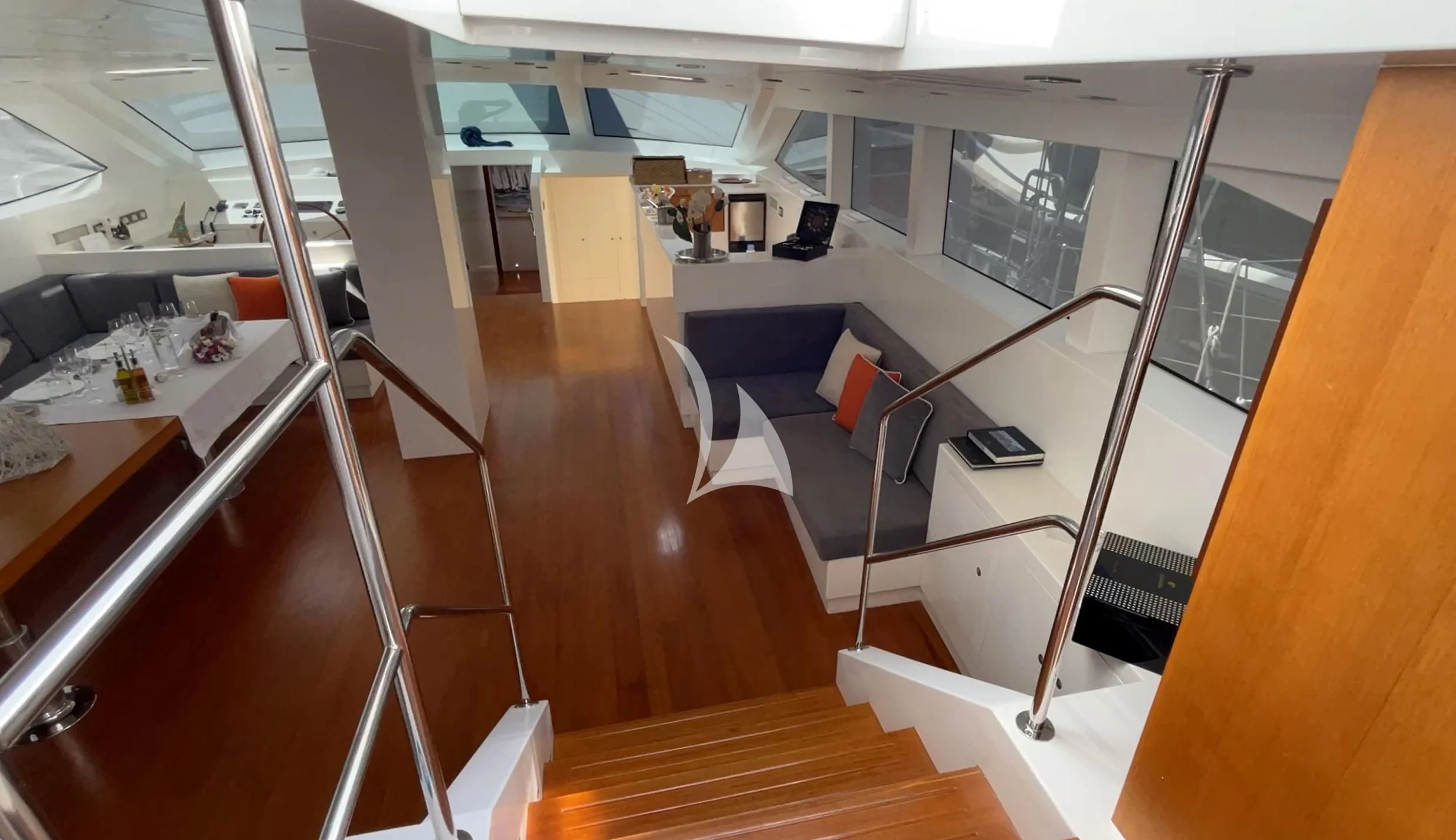 a room with a desk and chairs aboard UBI BENE Yacht for Charter