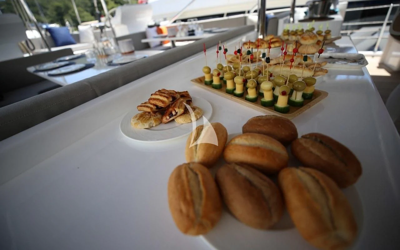a table with food on it aboard UBI BENE Yacht for Charter