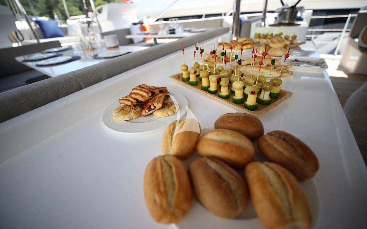 a table with food on it aboard UBI BENE Yacht for Charter