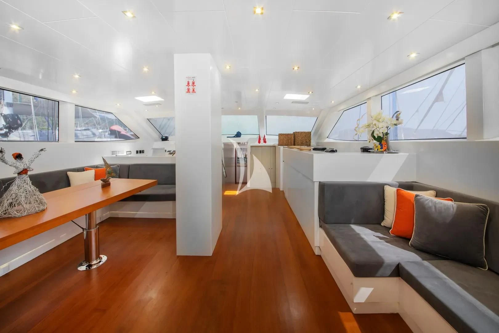 a room with a couch and a table aboard UBI BENE Yacht for Charter