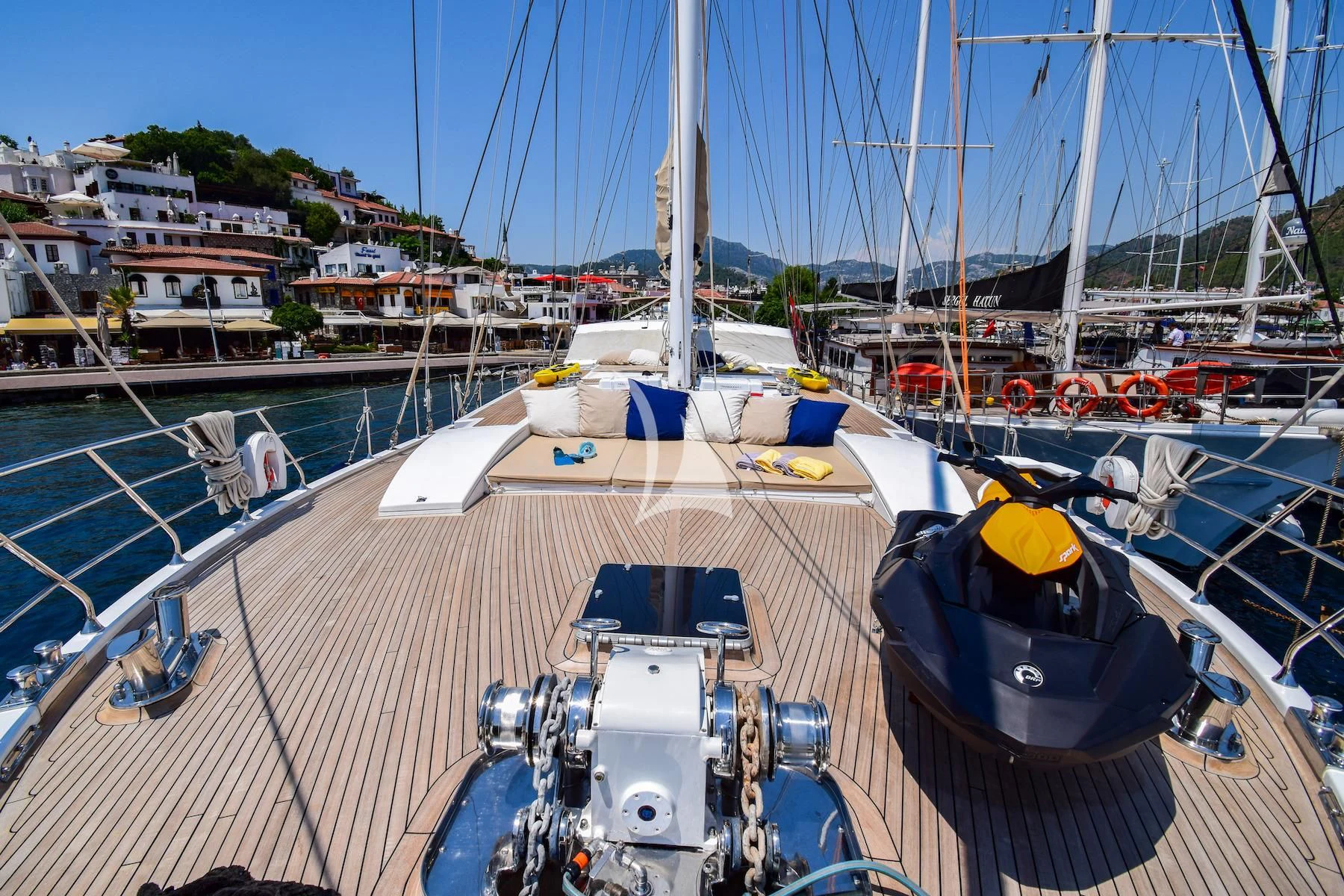 a boat docked at a pier aboard UBI BENE Yacht for Charter