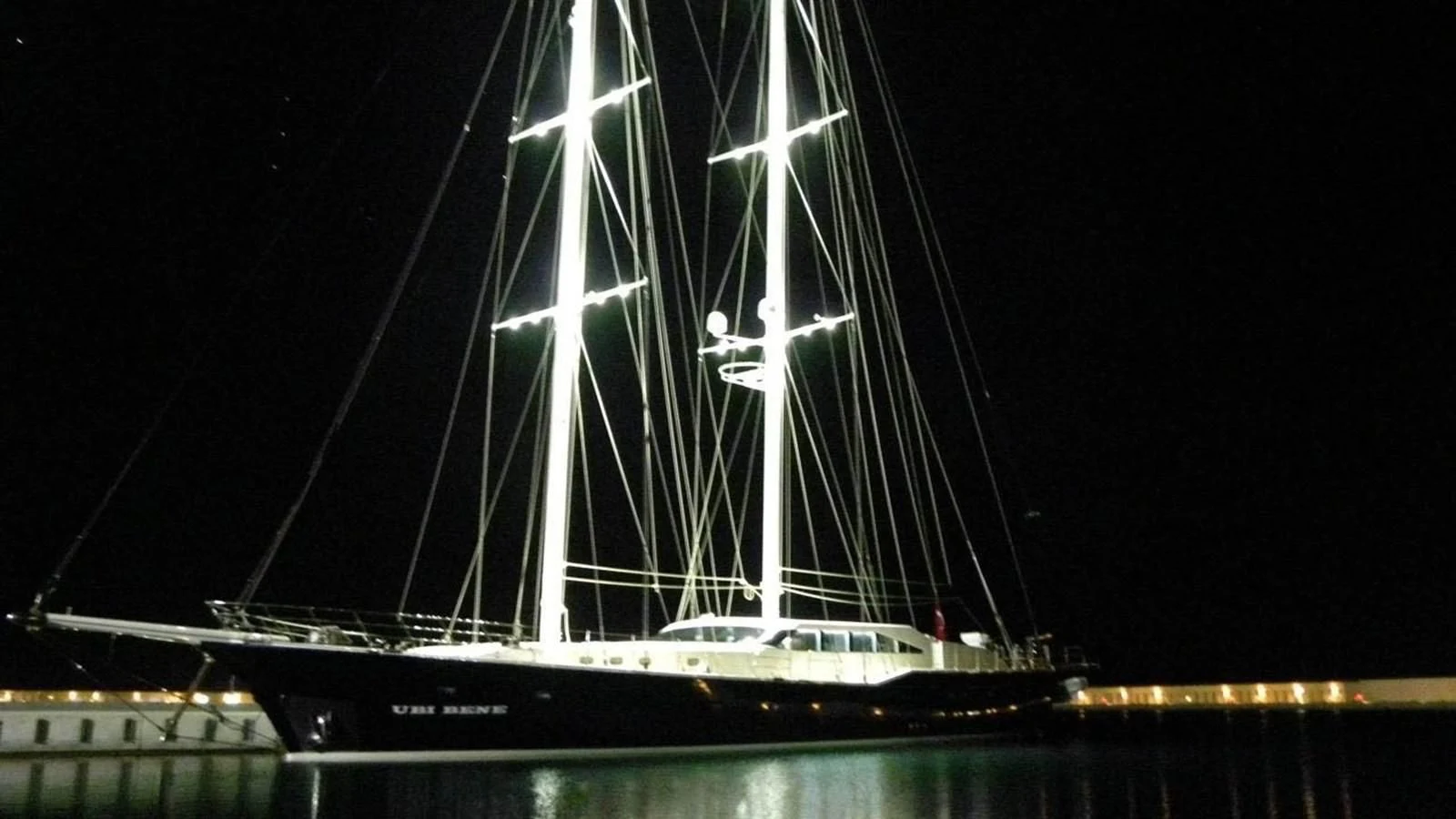 a large sailboat at night aboard UBI BENE Yacht for Charter