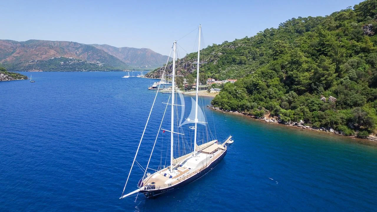 a boat sailing on the water aboard UBI BENE Yacht for Charter