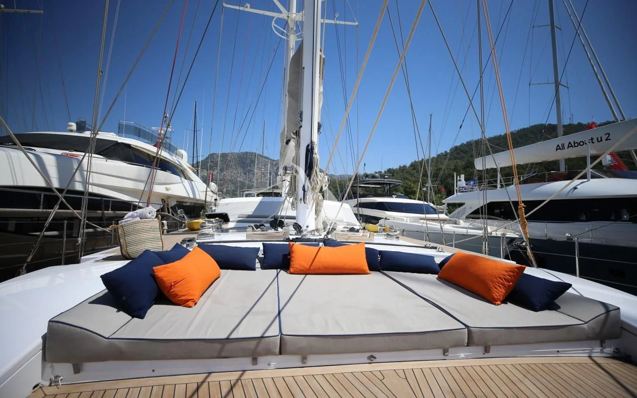 a boat is parked in a harbor aboard UBI BENE Yacht for Charter