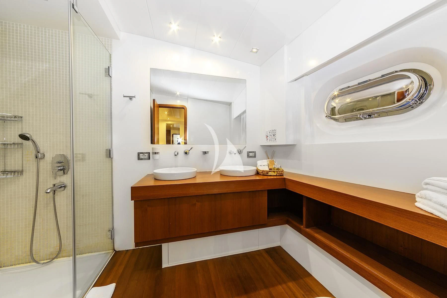a bathroom with a shower and sink aboard UBI BENE Yacht for Charter